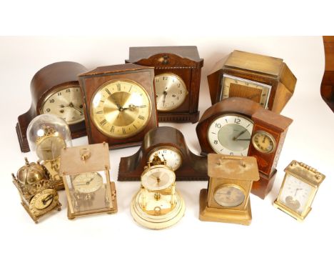 A collection of mid twentieth-century and later mantel, anniversary and carriage clocks, to include, Schatz, Metamec, and Smi