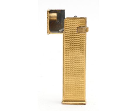 Alfred Dunhill Ltd; A Dunhill tallboy petrol pocket cigarette lighter made under Cartier licence, the gold plated textured bo