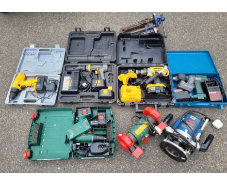 A collection of power tools to include a Bosch PSM125 240v 300w bench grinder, a boxed DeWalt XRP 18V battery drill with char
