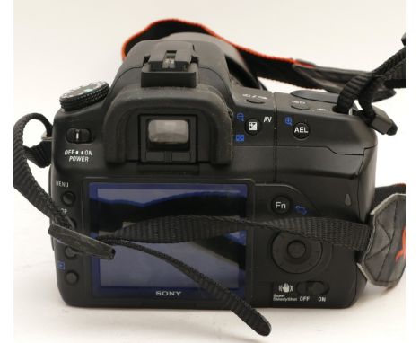 A Sony a200 DSLR camera, with a Tamron f/4-5.6 70-300mm lens.