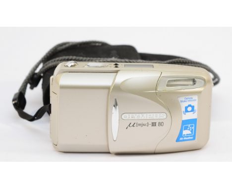 An Olympus mju III 80 camera, no. 4205699.