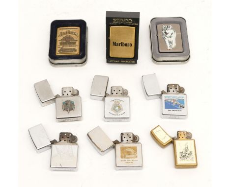 A collection of nine Zippo pocket cigarette lighters, petrol operated, cased and loose examples. (9)