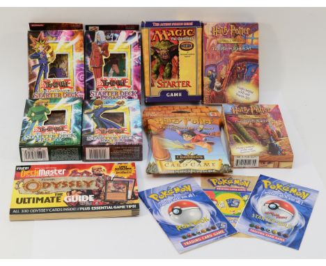 Vintage trading card game items to include Harry Potter, Yu-Gi-Oh and Odyssey game instructions, empty game boxes, playmats a