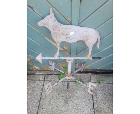 A painted steel weather vane, the finial in the form of a dog, 70cm tall.