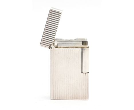 S.T. Dupont Paris; A silver plated Dupont cigarette lighter, gents size with ribbed decoration, stamped to base.