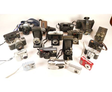 A collection of cameras and camera accessories, to include, a Fujifilm Finepix 1400 Zoom, a Nikon Coolpix 3600, and Pentax K1