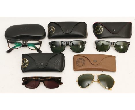 Four cased pairs of Ray-Ban sunglasses, together with a cased pair of Ray-Ban prescription glasses. (5)