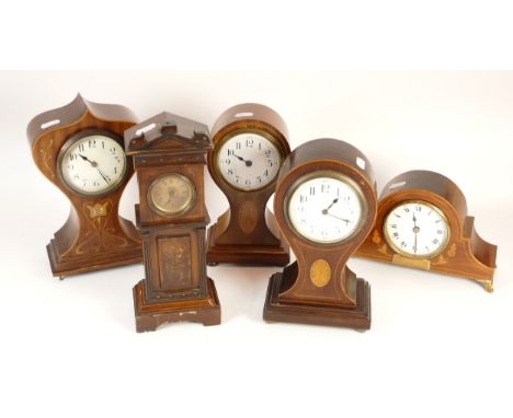 Five mahogany cased clocks mantel clocks, three with boxwood inlays, one, shaped in the form of a Grandfather clock. (5)