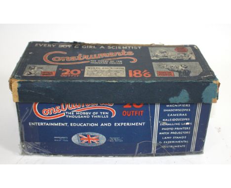 A vintage Construments Outfit 20 scientific construction set for making magnifiers, magic lanterns, cameras, kaleidoscopes, c