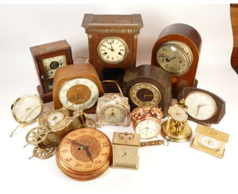 A collection of mid twentieth-century and later mantel, alarm and desk clocks, to include, Seiko, Smiths, and Westclox. (3 bo