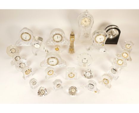 A selection of crystal glass mantel clocks, bedside clocks and miniature novelty clocks, makers to include Waterford, Edinbur