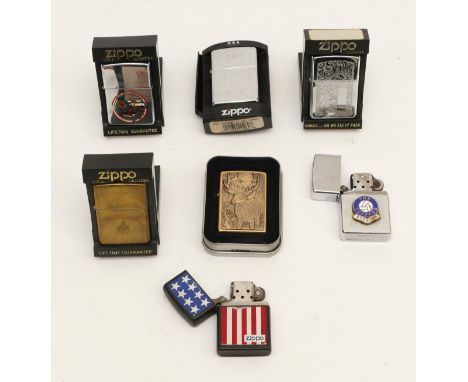 A collection of seven Zippo pocket cigarette lighters, petrol operated, cased and loose. (7)