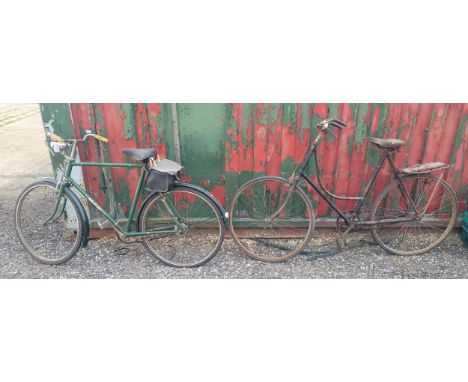 Two vintage bicycles, comprising a gents late 20th century three speed Raleigh, 20 inch frame, and a post war ladies hoop fra