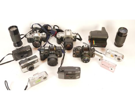 A collection of cameras and camera accessories, to include, a Ricoh KR-10, a Minolta 7000, and a Sigma f/4.5 100-200mm lens. 