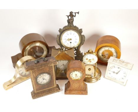 A collection of mid twentieth-century and later mantel and carriage clocks, to include, Bentima, Schatz, and Robert Blandford