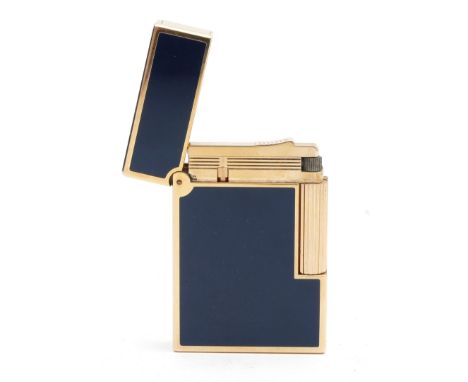 S.T Dupont Paris; A Dupont gents sized pocket gas cigarette lighter, gold plated with black enamelled panels, in presentation