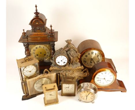 A collection of mid twentieth-century and later mantel, alarm and carriage clocks, to include, Westclox, Metamec, and London 