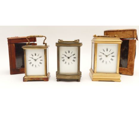 Three mid to late 20th century brass carriage clocks, housing eight day movements, to include, two examples with original pre