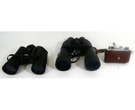 Two pairs of binoculars, to include, Mark Scheffel, 35 x 50, in case, and BOB Optik, 10-30 x 60, in travel pouch, together wi