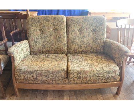 Ercol; Mid 20th century light beech framed two seater settee, with original cushions, W150, D66, H91cm, together with an Erco