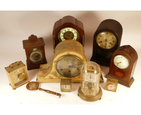 A collection of mid twentieth-century and later clocks, primarily mantel, with some anniversary and carriage clocks, to inclu