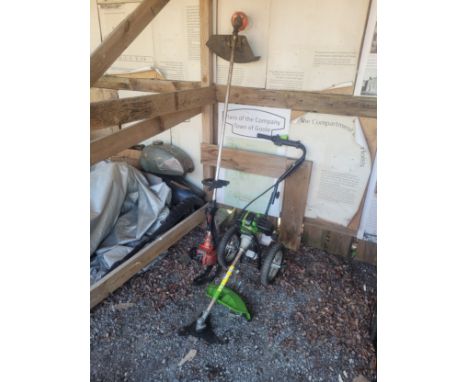 Victor Tools; A petrol driven caddy grass brusher, No 10596,  together with a Zenora petrol strimmer. (2)