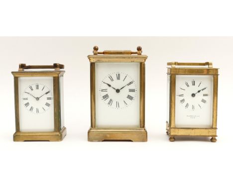 Three mid to late 20th century brass carriage clocks, housing eight day movements, to include, a Russells Ltd Paris example, 