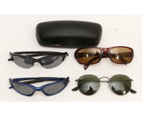 Three pairs of Oakley fashion sunglasses, together with a pair of Ray-Ban sunglasses. (4)