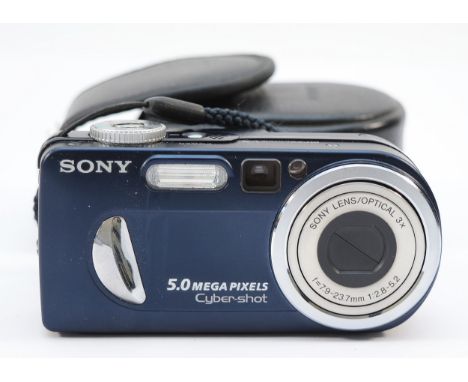 A Sony Cybershot DSC-P12 digital camera, in travel pouch.