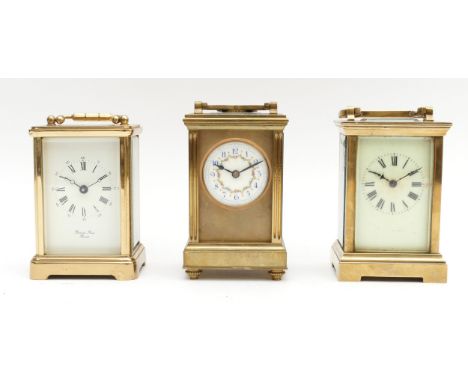 Three mid to late 20th century brass carriage clocks, housing eight day movements, to include, a Bonnard Freres example with 