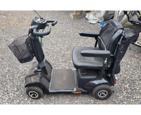 A Vantage X four wheeled mobility scooter, with key and charger. Untested, sold as seen.