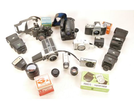 A collection of cameras and camera accessories, to include, a Pentax Super A, Canon EF f/3.5-4.5 25-70mm zoom lens, Sony Hand