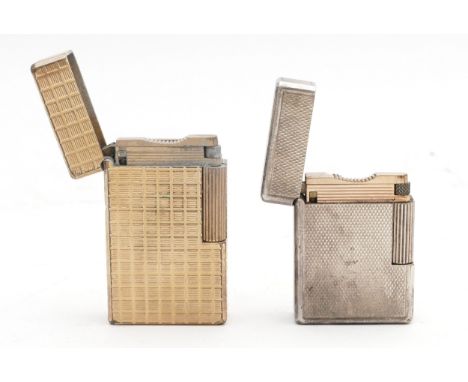 S.T.Dupont Paris; A Dupont gents gold plated pocket cigarette lighter, together with a ladies silver plated example, both gas