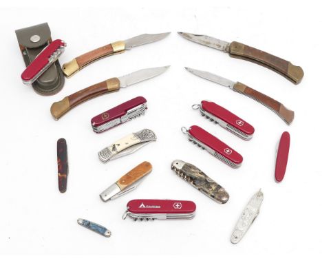 A collection of fourteen pocket folding penknives, of various styles and sizes, including Swiss Army style examples.
