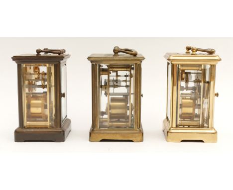 Three mid to late 20th century brass carriage clocks, housing eight day movements, to include, a London Clock Co example, H-1