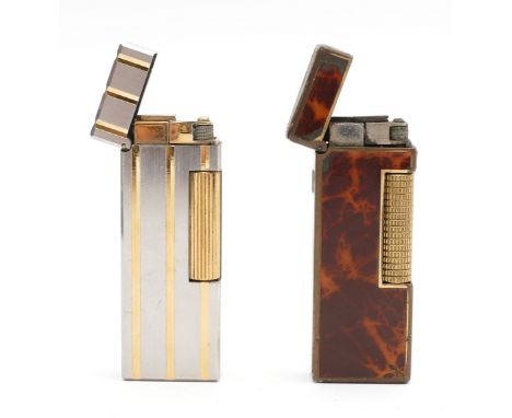 Alfred Dunhill Ltd; A cased Dunhill Rollagas pocket cigarette lighter, two tone silver &amp; gold plated, with instructions, 