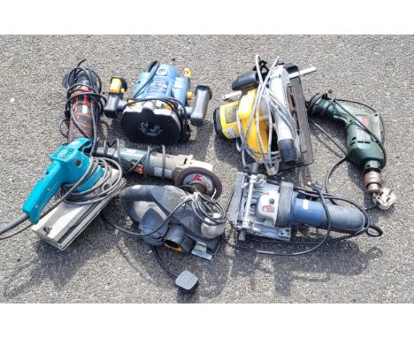 A collection of power tools to include a Power CraFT PBF-1200 240v 1200w router, a DeWalt D23620 230V 1150w circular saw, a B