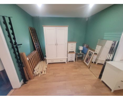 A group of Wren modern bedroom furniture pieces, to include a double wardrobe, W110, D55, H195cm, a pair of bedside drawers, 