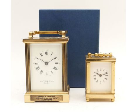 Mappin &amp; Webb, a brass carriage time piece, with applied presentation plaque, 12cm, box, key, together with a smaller exa