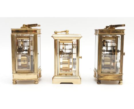 Three mid to late 20th century brass carriage clocks, housing eight day movements, to include, an Asprey example with origina