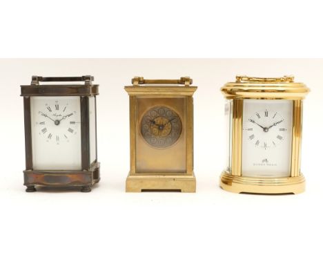 Three mid to late 20th century brass carriage clocks, housing eight day movements, to include, a Matthew Norman example, cyli