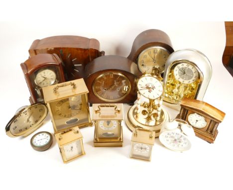 A collection of mid twentieth-century and later mantel, desk and carriage clocks, to include, History Craft, Cresta, and Acct