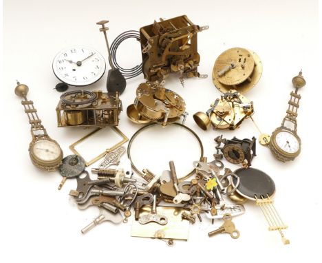 An assortment of clock parts, for spares/repair, to include, keys, dials, and movements. (1 box)