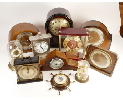 A collection of mid twentieth-century and later mantel, anniversary and wall clocks, to include, Seiko, Smith, and Miles. (2 