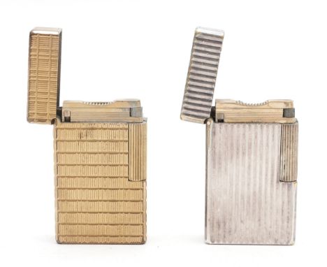 S.T. Dupont Paris; A gold plated gents size Dupont gas pocket cigarette lighter, together with a silver plated example, havin