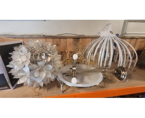 Three contemporary brass plated ceiling chandeliers each with glass droplets and cut glass bobeches, two five branch and one 
