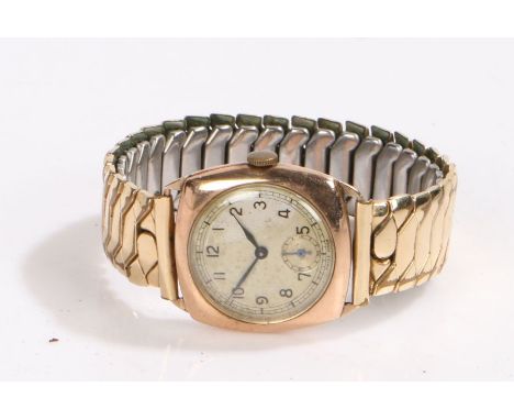 9 carat gold ladies wristwatch, the silver dial with Arabic numerals and subsidiary seconds dial, manual wound, the case 27.5