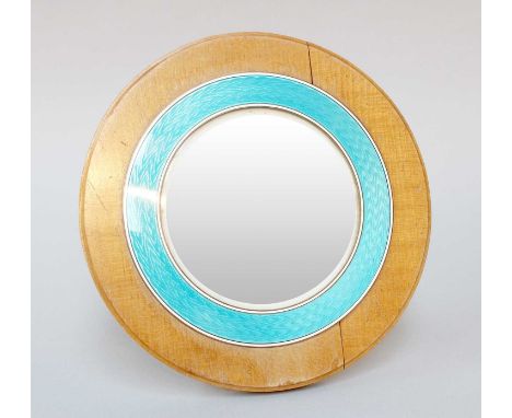 A Continental Enamelled Photograph-Frame, circular, the front with turquoise enamel on an engine-turned ground, with wood sur