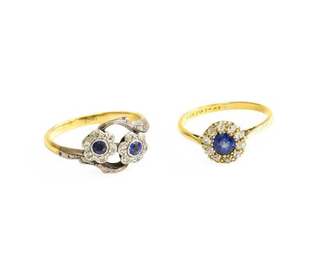 A Sapphire and Diamond Double Cluster Twist Ring, the round cut sapphires within borders of eight-cut diamonds, in white rubb