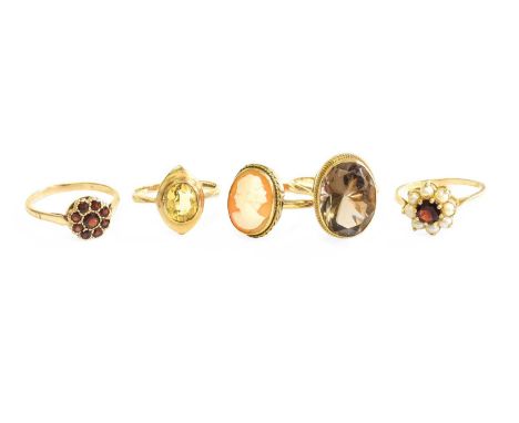 Four 9 Carat Gold Rings, comprising of two quartz examples, a garnet cluster example and a cameo example; together with A Spl